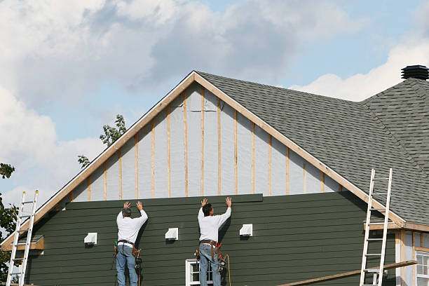 Professional Siding Installation technician working in Covington, IN